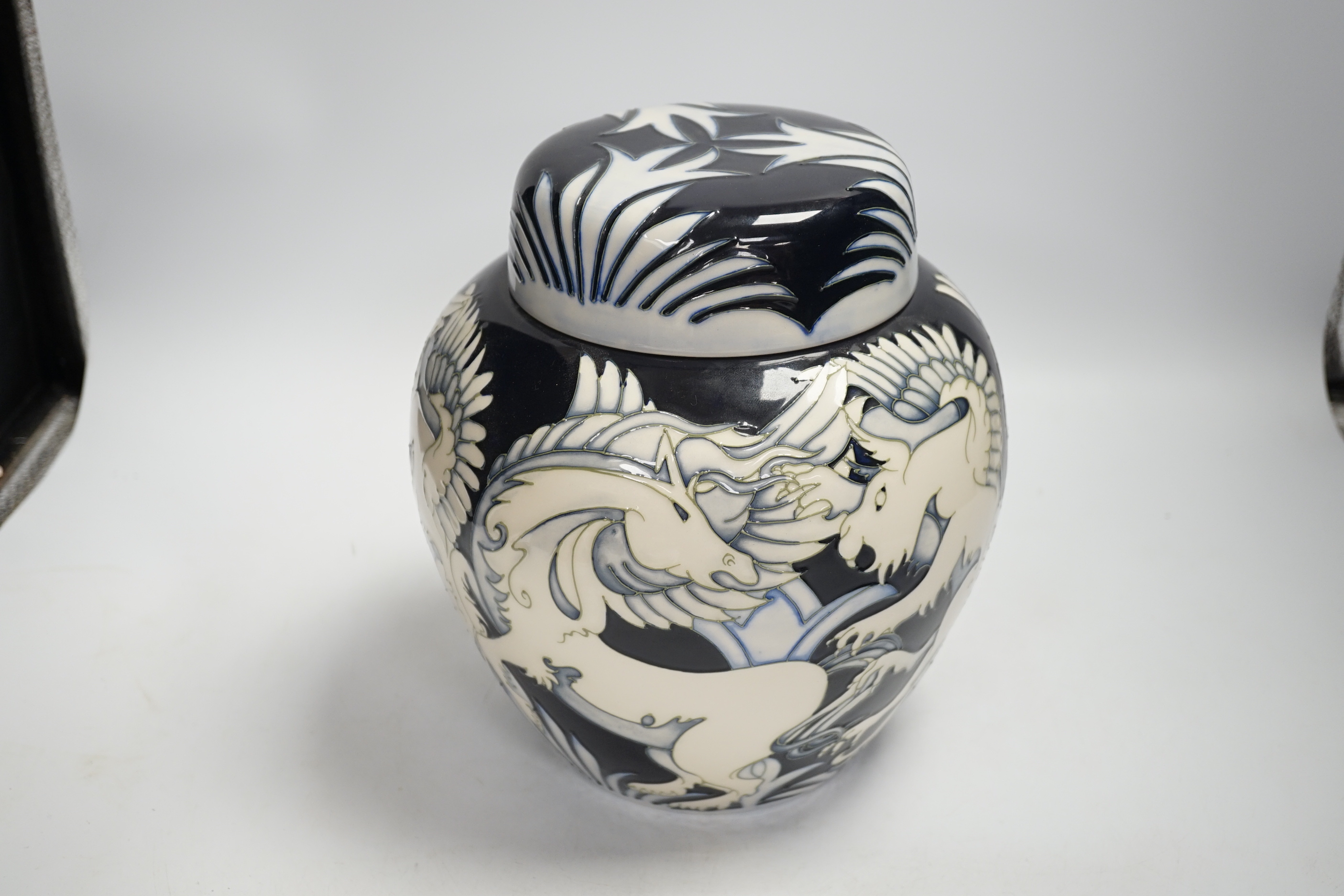 A large Moorcroft ‘Dance of the Griffin’ jar and cover, limited edition no 11/100. Designed by Vicky Lovatt. 24.5cm